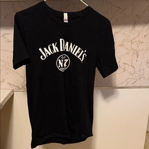Jack Daniel’s with #jackbullriding logo on sleeve